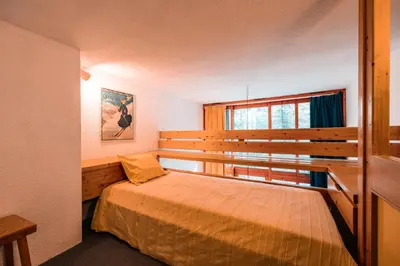Un ou plusieurs lits dans un hébergement de l'établissement Résidence Vogel - Agréable duplex 6 personnes avec une très belle vue sur la vallée dans le village de Charmettoger à Arc 1800 MAE-9633