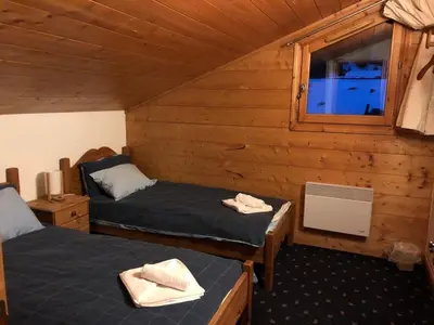 Un ou plusieurs lits dans un hébergement de l'établissement Time to Ski - Piaf