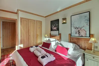 Un ou plusieurs lits dans un hébergement de l'établissement ARC 1950, Appartement 1 chambre, 4 personnes, Exposition Sud, SAUNA, HAMMAM, JACUZZI, PISCINE