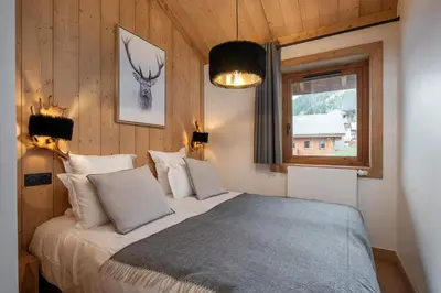 Un ou plusieurs lits dans un hébergement de l'établissement Apartment Peridot Champagny-en-Vanoise - by EMERALD STAY