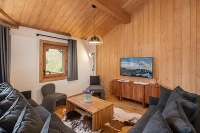 Coin salon dans l'établissement Apartment Peridot Champagny-en-Vanoise - by EMERALD STAY