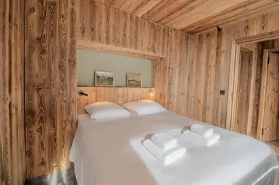 Un ou plusieurs lits dans un hébergement de l'établissement Les Hauts de Val Stunning Apartment with Panoramic View