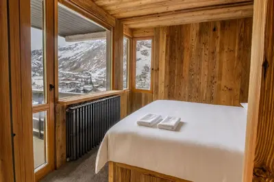 Un ou plusieurs lits dans un hébergement de l'établissement Les Hauts de Val Stunning Apartment with Panoramic View
