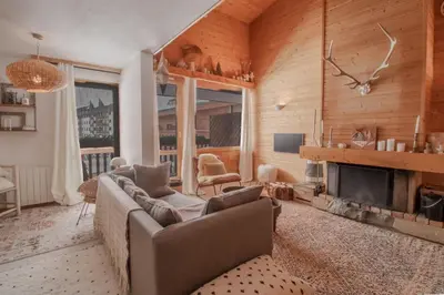 Coin salon dans l'établissement Hameau de Val 1389 Spacious cosy duplex in the heart of Val d’Isère
