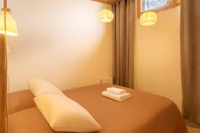 Un ou plusieurs lits dans un hébergement de l'établissement Hameau de Val 1389 Spacious cosy duplex in the heart of Val d’Isère