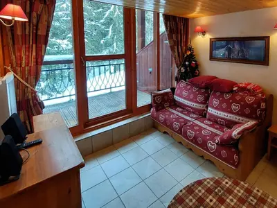 Coin salon dans l'établissement Cosy Duplex Arc1800 Aiguille Grive1 6 personnes