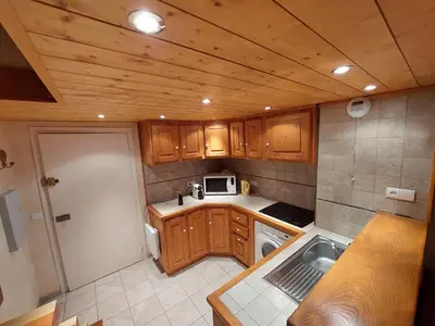 Cuisine ou kitchenette dans l'établissement Cosy Duplex Arc1800 Aiguille Grive1 6 personnes