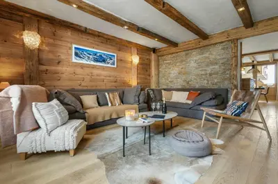Coin salon dans l'établissement Appartement le Roc - Rond point des pistes