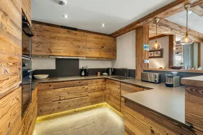 Cuisine ou kitchenette dans l'établissement Appartement le Roc - Rond point des pistes