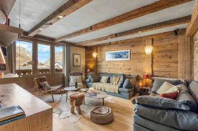 Coin salon dans l'établissement Appartement le Roc - Rond point des pistes