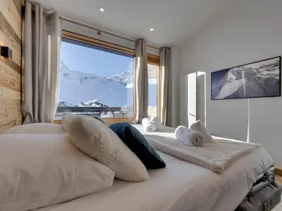 Un ou plusieurs lits dans un hébergement de l'établissement Duplex 45m² pour 4 pers, ski aux pieds à Tignes Val Claret - FR-1-641-125