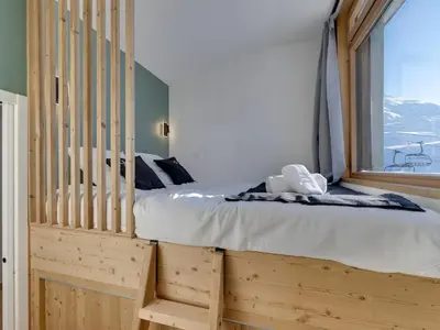 Un ou plusieurs lits dans un hébergement de l'établissement Duplex 45m² pour 4 pers, ski aux pieds à Tignes Val Claret - FR-1-641-125