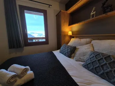 Un ou plusieurs lits dans un hébergement de l'établissement Élégant Duplex - Sainte Foy Station - 10 pers