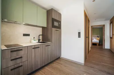 Cuisine ou kitchenette dans l'établissement Résidence Freddie
