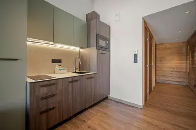 Cuisine ou kitchenette dans l'établissement Résidence Freddie