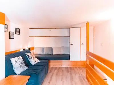 Coin salon dans l'établissement Résidence Aiguille Grive Bat I - Duplex pour 5 personnes à Arc 1800 dans le village de Charmettoger, skis aux pieds MAE-7733