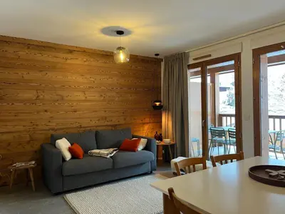 Coin salon dans l'établissement Appartement 4 pièces avec balcon à Pralognan-la-Vanoise - FR-1-464-260