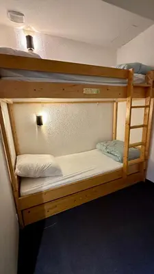 Un ou plusieurs lits dans un hébergement de l'établissement Duplex des Cimes - Ménage inclus - Ski IN-OUT - Arc 2000 - La conciergerie du Varet