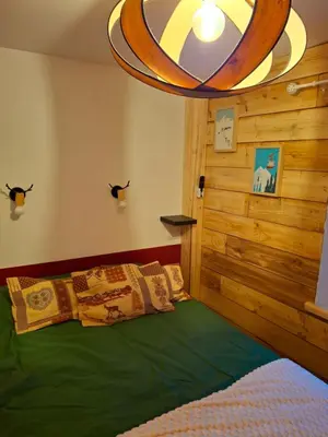 Un ou plusieurs lits dans un hébergement de l'établissement L'essendole, 3 chambres, très proche du centre