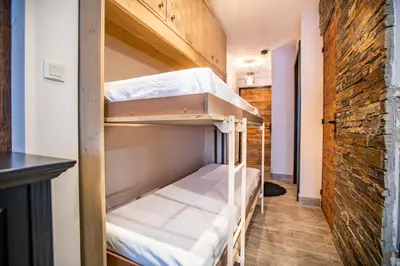 Un ou plusieurs lits dans un hébergement de l'établissement MyHome - Beau T2 rénové Tichot centre Val Claret