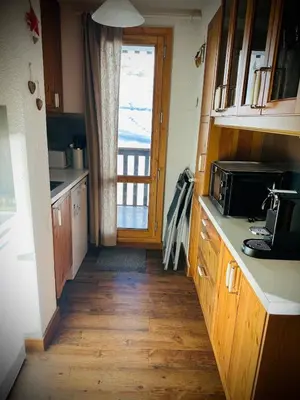 Cuisine ou kitchenette dans l'établissement Bel appartement ski aux pieds 5 personnes 2 chambres BELLE PLAGNE