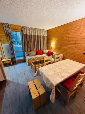 Un ou plusieurs lits dans un hébergement de l'établissement Bel appartement ski aux pieds 5 personnes 2 chambres BELLE PLAGNE