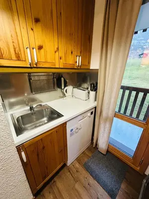 Cuisine ou kitchenette dans l'établissement Bel appartement ski aux pieds 5 personnes 2 chambres BELLE PLAGNE