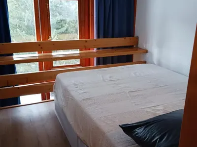 Un ou plusieurs lits dans un hébergement de l'établissement Duplex skis aux pieds pour 6 à Arc 1800, balcon au sud-est - FR-1-411-1011