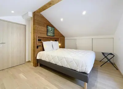 Un ou plusieurs lits dans un hébergement de l'établissement Large New Duplex, 10 People Mountain View & Terrace