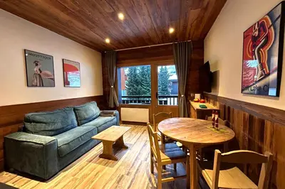 Coin salon dans l'établissement Chalet de Solaise B03
