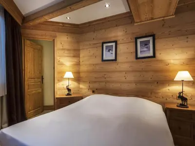 Un ou plusieurs lits dans un hébergement de l'établissement Appartement spacieux 6-7 pers, Balcon, Ski aux pieds, Parking couvert - FR-1-862-12