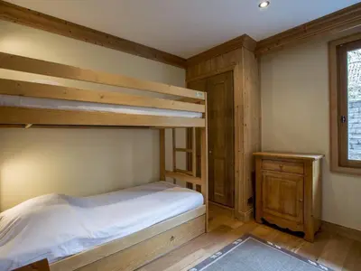 Un ou plusieurs lits dans un hébergement de l'établissement Appartement spacieux 6-7 pers, Balcon, Ski aux pieds, Parking couvert - FR-1-862-12