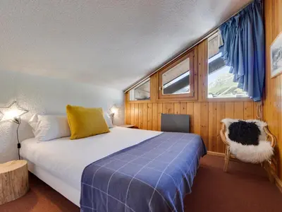 Un ou plusieurs lits dans un hébergement de l'établissement Duplex rénové ski aux pieds avec balcon pour 6 personnes à Val-d'Isère - FR-1-862-30