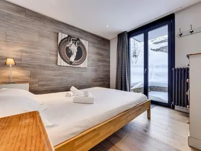 Un ou plusieurs lits dans un hébergement de l'établissement Appartement rénové 5 pers, Val d'Isère, centre, balcon - FR-1-862-33