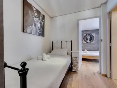 Un ou plusieurs lits dans un hébergement de l'établissement Appartement rénové 5 pers, Val d'Isère, centre, balcon - FR-1-862-33