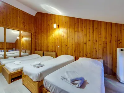 Un ou plusieurs lits dans un hébergement de l'établissement Appartement ski aux pieds avec parking couvert à Val d'Isère - FR-1-862-2