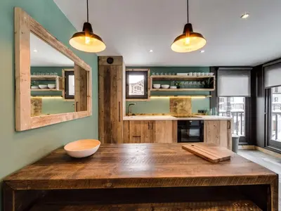 Cuisine ou kitchenette dans l'établissement Appartement rénové au pied des pistes avec Parking couvert - FR-1-862-35