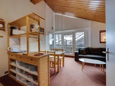 Coin salon dans l'établissement Appartement lumineux 5 pers, cheminée, parking couvert - FR-1-862-31