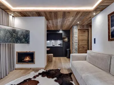 Coin salon dans l'établissement Appartement rénové, ski aux pieds avec parking couvert - FR-1-862-28