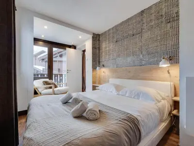 Un ou plusieurs lits dans un hébergement de l'établissement Appartement lumineux 5 pers au pied des pistes avec parking couvert - FR-1-862-39