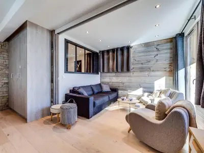 Coin salon dans l'établissement Appartement rénové ski aux pieds balcon à Val-d'Isère - FR-1-862-44