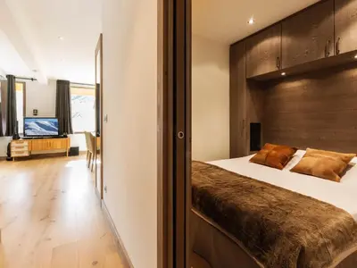 Un ou plusieurs lits dans un hébergement de l'établissement Appartement rénové ski aux pieds balcon à Val-d'Isère - FR-1-862-44