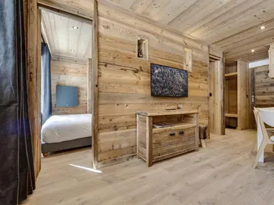 Un ou plusieurs lits dans un hébergement de l'établissement Appartement rénové, Ski aux pieds, Parking couvert - FR-1-862-56