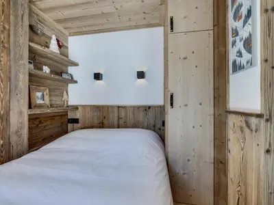 Un ou plusieurs lits dans un hébergement de l'établissement Appartement rénové, Ski aux pieds, Parking couvert - FR-1-862-56