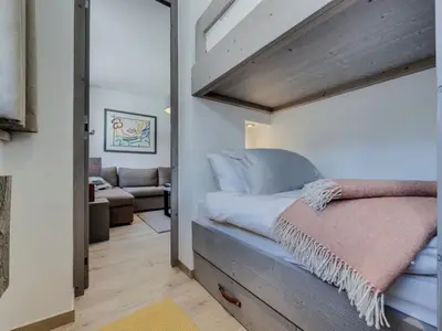 Un ou plusieurs lits dans un hébergement de l'établissement Appartement rénové, confort moderne au pied des pistes - FR-1-862-58