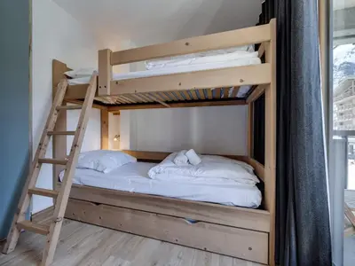 Un ou plusieurs lits dans un hébergement de l'établissement Appartement Rénové 4 Pers. Ski aux Pieds avec Parking - FR-1-862-53