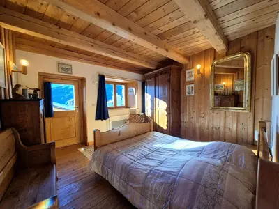 Un ou plusieurs lits dans un hébergement de l'établissement Charmant chalet 6 personnes - Montvalezan