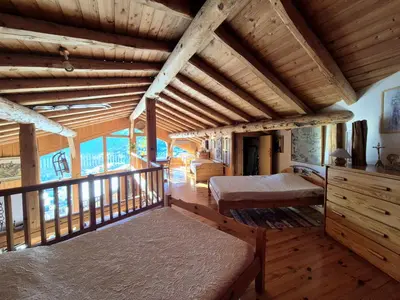 Un ou plusieurs lits dans un hébergement de l'établissement Charmant chalet 6 personnes - Montvalezan