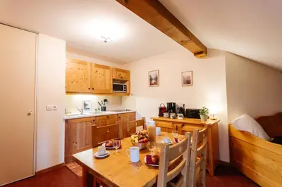 Cuisine ou kitchenette dans l'établissement Le Cocon