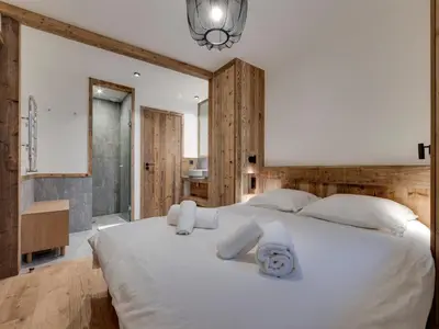 Un ou plusieurs lits dans un hébergement de l'établissement Chalet Élégant au Pied des Pistes à Val d'Isère - FR-1-567-139